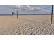 Beach volleyball court with ocean view at 737 Shakett Creek Dr, Nokomis, FL 34275