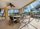 Outdoor patio with seating, hot tub, and stunning water views at 737 Shakett Creek Dr, Nokomis, FL 34275