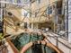 Inviting pool and spa area with ample deck space at 737 Shakett Creek Dr, Nokomis, FL 34275