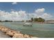 Sailboat navigating a calm waterway at 737 Shakett Creek Dr, Nokomis, FL 34275