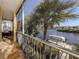 Enjoy the view from this screened balcony overlooking the water at 737 Shakett Creek Dr, Nokomis, FL 34275