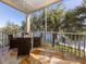 Relaxing screened balcony with water views and seating area for outdoor enjoyment at 737 Shakett Creek Dr, Nokomis, FL 34275