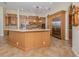 Large kitchen with island and stainless steel appliances at 7551 Conservation Ct, Sarasota, FL 34241