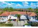 Aerial view showcasing the community's layout, carports, and proximity to the natural surroundings at 804 Montrose Dr # 103, Venice, FL 34293