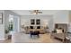 Cozy living room with neutral colors, stylish furniture, and plenty of natural light at 804 Montrose Dr # 103, Venice, FL 34293