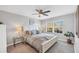 Serene bedroom featuring luxury vinyl plank flooring and ample natural light at 804 Montrose Dr # 103, Venice, FL 34293