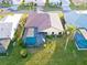 Property with screened pool and backyard at 93 Inlets Blvd # 93, Nokomis, FL 34275