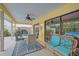 Outdoor patio with seating area and view of the pool at 93 Inlets Blvd # 93, Nokomis, FL 34275