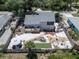 Landscaped backyard with patio, firepit and gazebo at 1172 Kenisco Rd, Venice, FL 34293