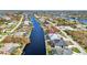 Wide canal view showing many houses at 15004 Alsask Cir, Port Charlotte, FL 33981