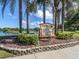 Chestnut Creek community entrance sign with directions to various sections at 241 Woodingham Trl, Venice, FL 34292