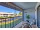 Peaceful screened balcony overlooking water at 400 Mission E Trl # D, Venice, FL 34285