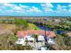 Aerial view of three townhouses with private garages and carport at 804 Montrose Dr # 103, Venice, FL 34293