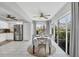 Kitchen and dining area with sliding doors leading to a patio at 804 Montrose Dr # 103, Venice, FL 34293