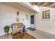 Condo entryway with seating area and screen door at 804 Montrose Dr # 103, Venice, FL 34293