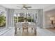 Light and bright dining area with sliding glass doors and view to patio at 804 Montrose Dr # 103, Venice, FL 34293