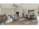 Open concept dining room with view into kitchen and screened patio at 4646 Fallon Cir, Port Charlotte, FL 33948
