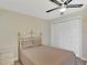 Bedroom with double closet and ceiling fan at 4646 Fallon Cir, Port Charlotte, FL 33948
