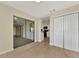 Room with access to patio and kitchen at 4646 Fallon Cir, Port Charlotte, FL 33948