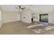 Dining area with view into kitchen and access to screened patio at 4646 Fallon Cir, Port Charlotte, FL 33948