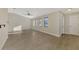 Bright living room with tile floors and lots of natural light at 4646 Fallon Cir, Port Charlotte, FL 33948
