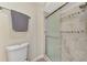Bathroom with walk-in shower and tile surround at 4646 Fallon Cir, Port Charlotte, FL 33948