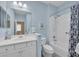 Clean bathroom with white vanity, shower, and bathtub at 1222 Collier Pl, Venice, FL 34293