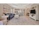 Open living room and kitchen with neutral color scheme at 1222 Collier Pl, Venice, FL 34293