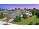 Single-Gathering home with tile roof and two-car garage at 1222 Collier Pl, Venice, FL 34293