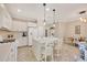Well-equipped kitchen with white cabinets and gas range at 1222 Collier Pl, Venice, FL 34293