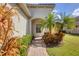 Brick-paved pathway leads to the front entrance of the home at 1222 Collier Pl, Venice, FL 34293