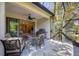 Screened patio with seating area and view of the living room at 1222 Collier Pl, Venice, FL 34293