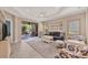 Living room with access to the screened lanai at 1222 Collier Pl, Venice, FL 34293