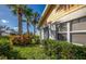 Landscaped backyard with lush greenery at 172 Southampton Pl # 346, Venice, FL 34293