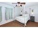Cozy bedroom with a post bed and plenty of light at 172 Southampton Pl # 346, Venice, FL 34293