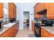 Bright kitchen with granite countertops and modern appliances at 172 Southampton Pl # 346, Venice, FL 34293