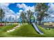 playground with slide and climbing features at 172 Southampton Pl # 346, Venice, FL 34293