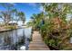 Wooden dock offering scenic canal views at 852 E 6Th St, Englewood, FL 34223