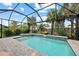 Enjoy this refreshing pool and spa with a water feature at 9888 Bright Water Dr, Englewood, FL 34223