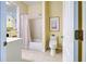 Clean bathroom with a shower/tub combo and toilet at 1704 Triano Cir # 1704, Venice, FL 34292