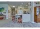 Modern kitchen with stainless steel appliances and breakfast bar at 1704 Triano Cir # 1704, Venice, FL 34292