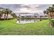 Scenic community lake with residential buildings at 1704 Triano Cir # 1704, Venice, FL 34292