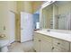Bright bathroom featuring a single vanity and a shower at 1704 Triano Cir # 1704, Venice, FL 34292