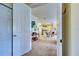Open concept living area with a view into the kitchen at 1704 Triano Cir # 1704, Venice, FL 34292