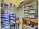 Organized storage room with shelving and drawers at 1704 Triano Cir # 1704, Venice, FL 34292