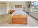 Main bedroom with large window, ample natural light, and carpet flooring at 1704 Triano Cir # 1704, Venice, FL 34292