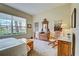 Main bedroom with large window, ample natural light, and carpet flooring at 1704 Triano Cir # 1704, Venice, FL 34292