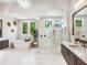 A bright bathroom featuring a soaking tub, a shower, a large mirror and a vanity at 1109 Bayshore Rd, Nokomis, FL 34275