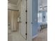 Clean and well-maintained bathroom with a tub/shower combination and neutral tile flooring at 13848 Rinuccio St, Venice, FL 34293