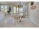 Charming breakfast nook with table and chairs, adjacent to kitchen at 13848 Rinuccio St, Venice, FL 34293